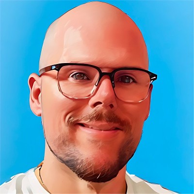 portrait of a smiling man with glasses